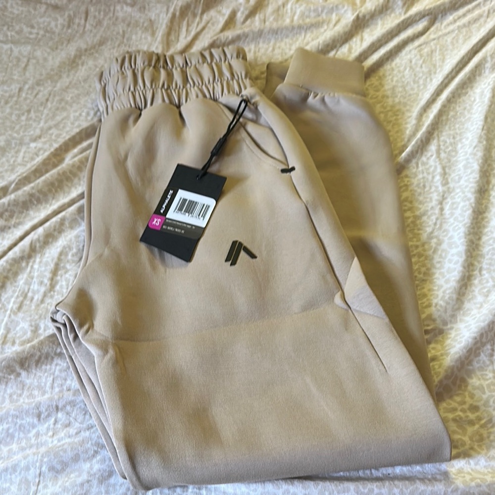 Alphalete ELMNTS tan cuffed joggers
